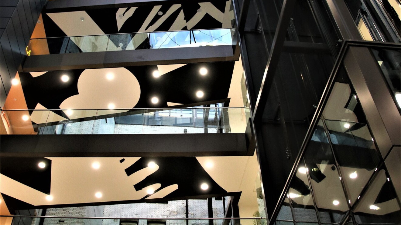 View from below of the multiple floors in the  Amazon Manchester offices. 