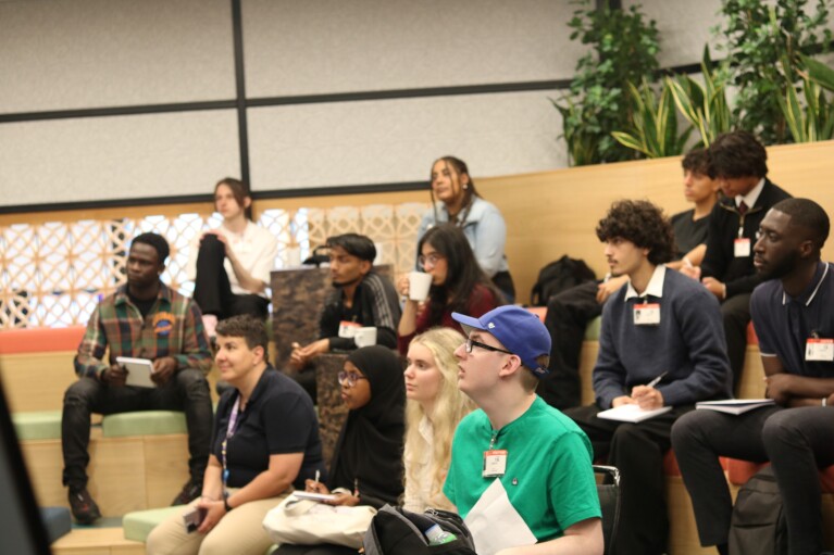 Diverse group of young adults attending a seminar or workshop