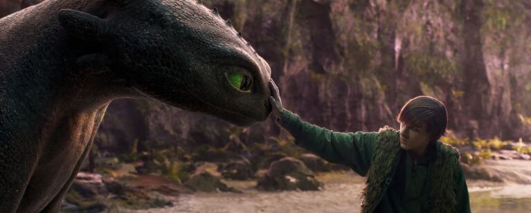 Mason Thames stars as Hiccup against Toothless the dragon in How To Train Your Dragon live-action remake