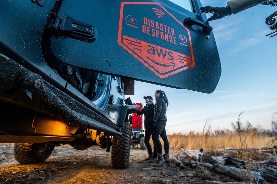 An image of a truck door with a decal on it that says "disaster response AWS."