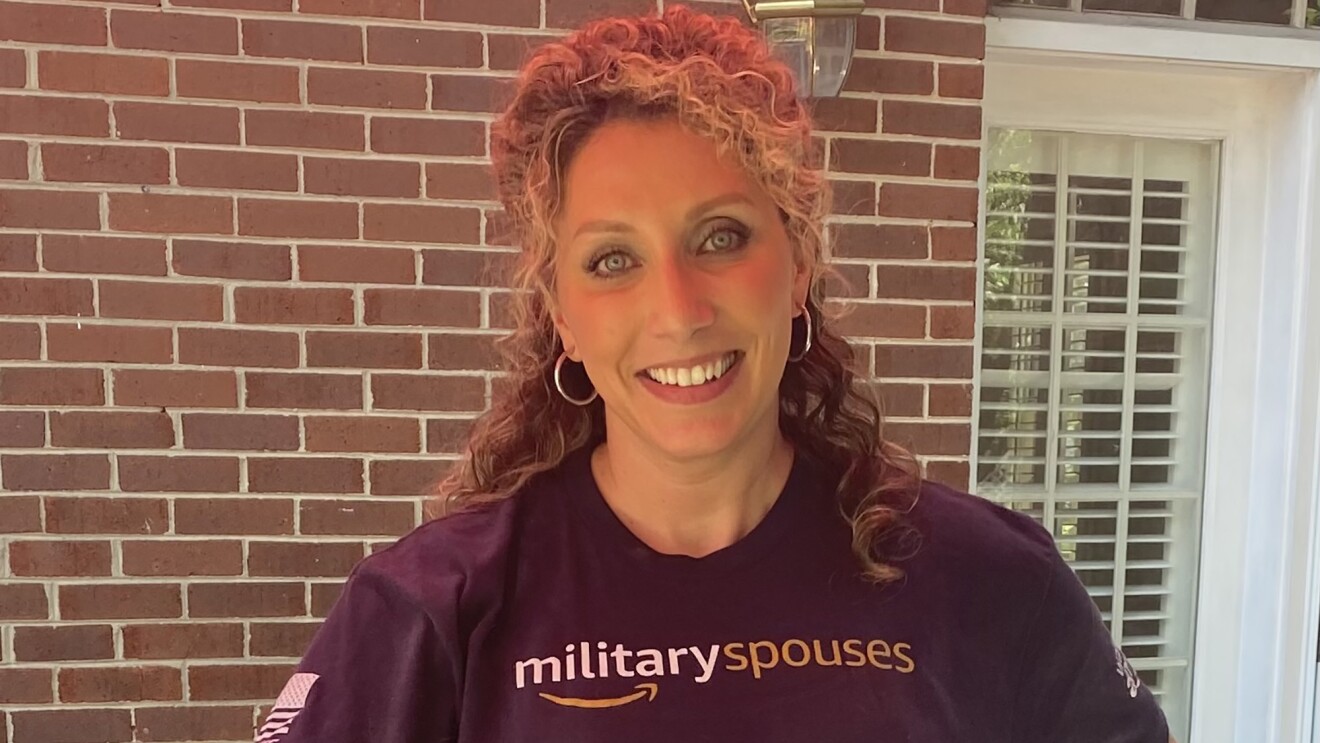 Amazon launches new technology to support military spouses 9 An Amazon employee smiles at the camera