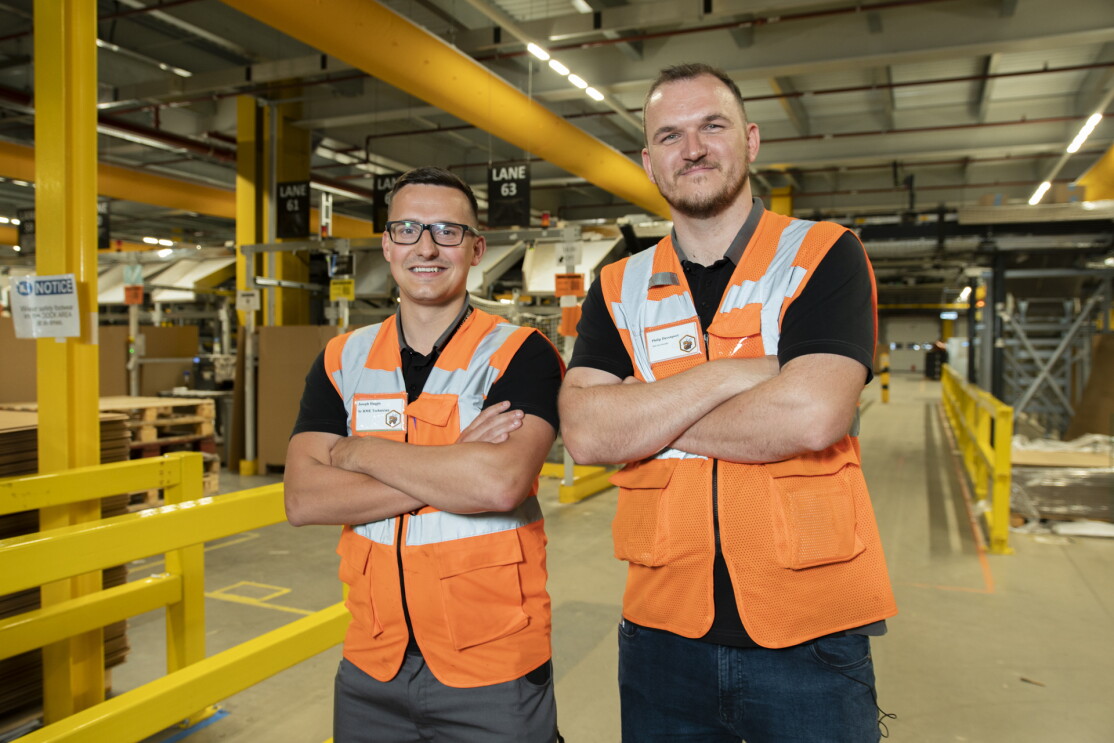 Military veterans Phil Davenport and Joe Haggis in an Amazon fulfilment centre