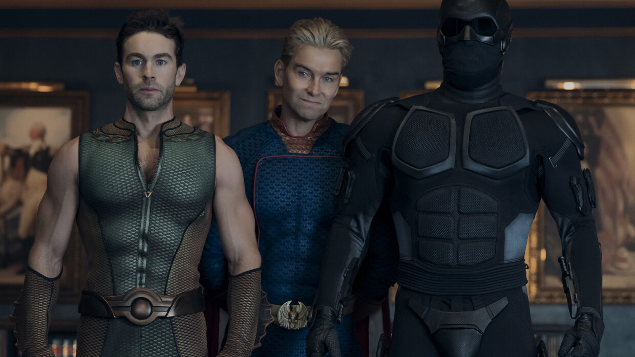 Three action heroes standing 