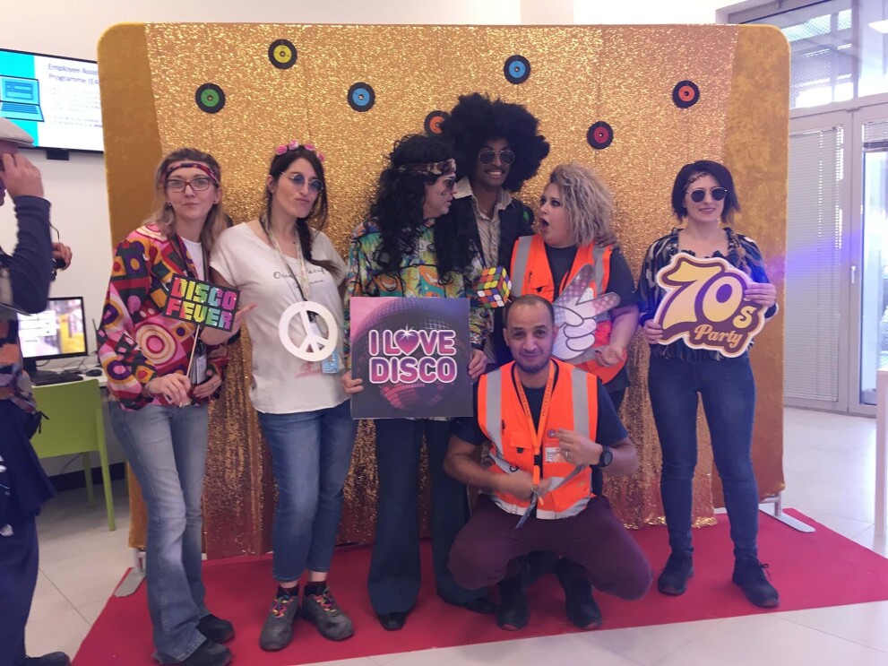 Amazon associates in our Milan fulfillment center participate in a 70s theme