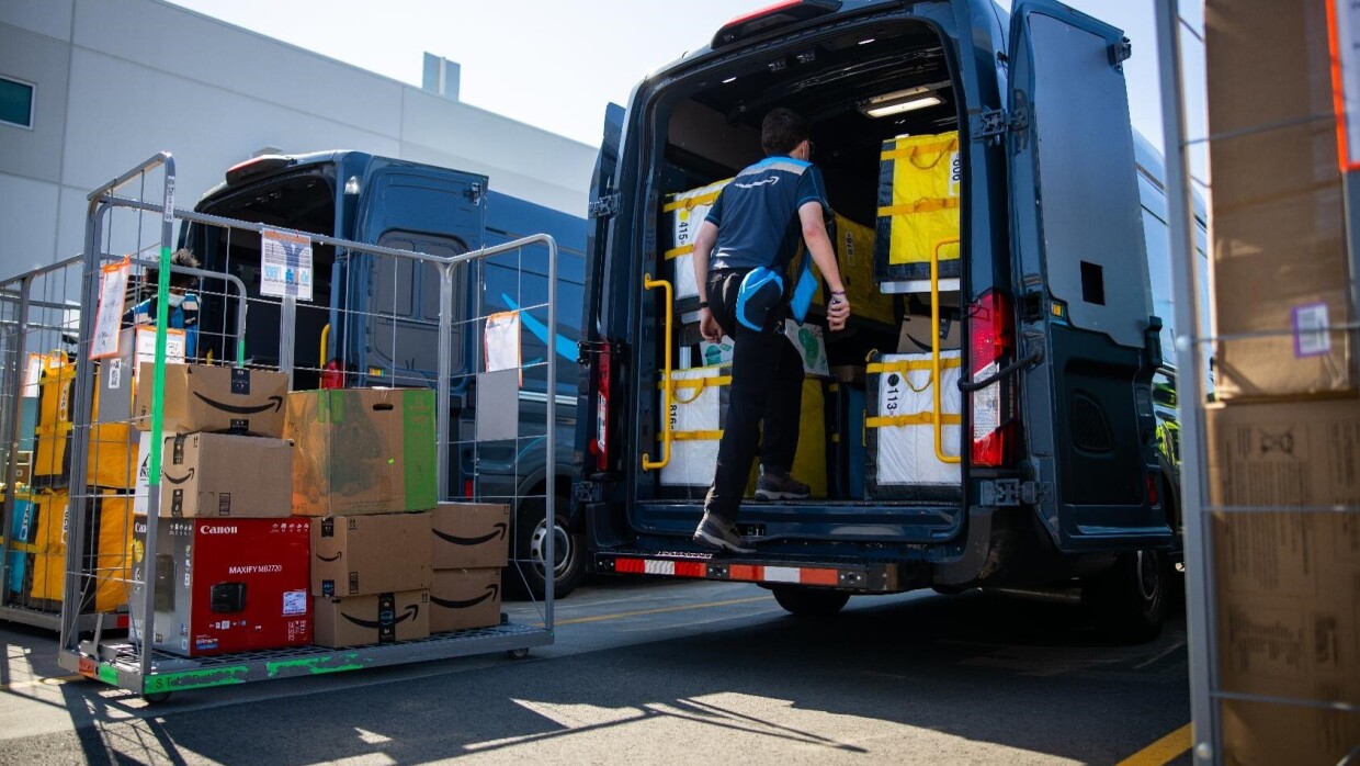 Delivery driver loading a van
