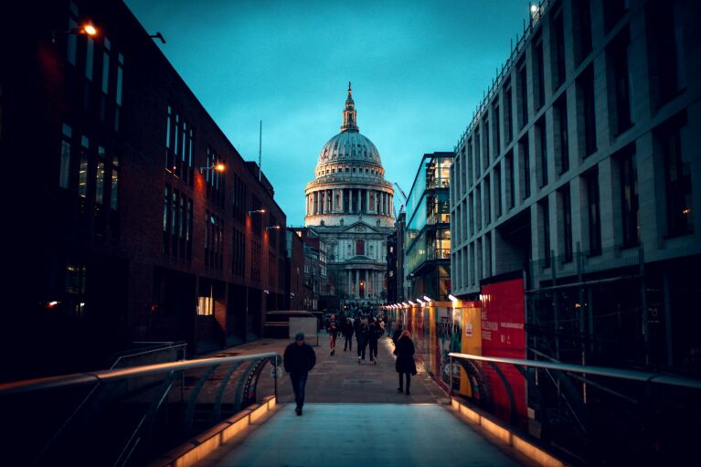 People walking down a street in London