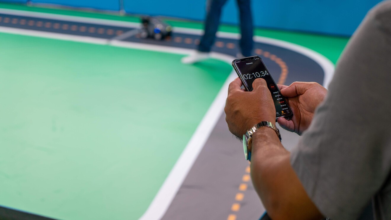 AWS DeepRacer car and track, a machine learning car with adult and kids' leagues