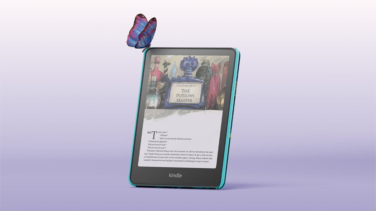 Kindle Colorsoft displaying a fantasy book page with colorful butterfly perched on top