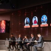 4 panelists and an interviewer from the Luxembourg Chamber of commerce on stage. 