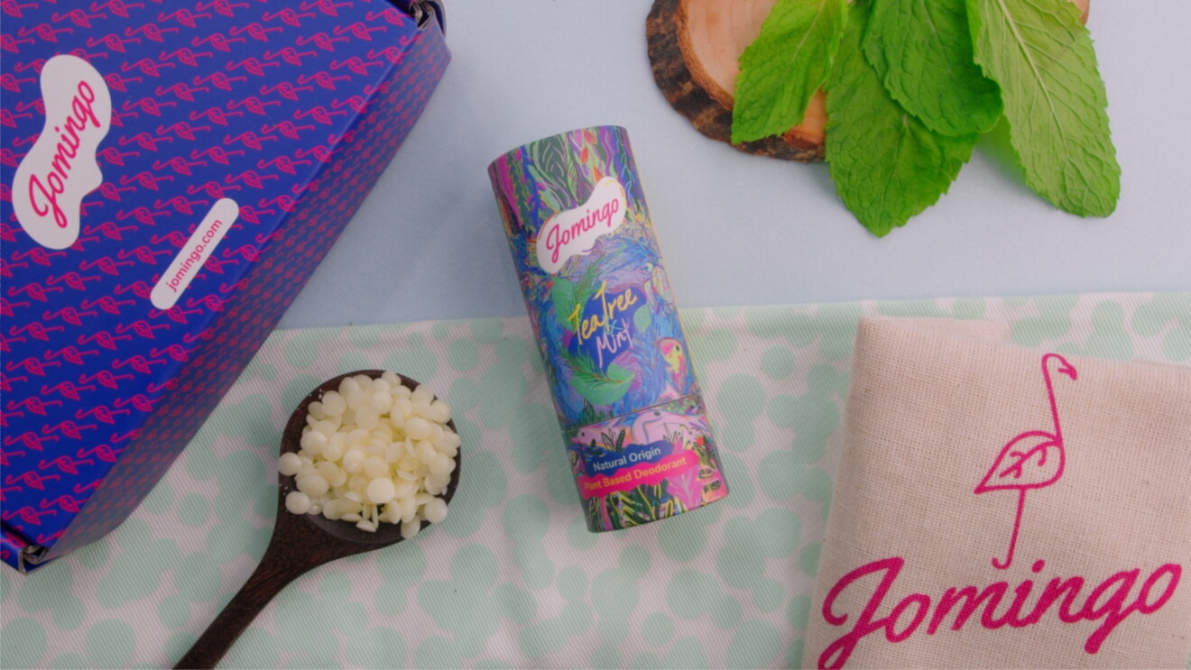 A flat lay of Jomingo's Tea Tree Mint deodorant 