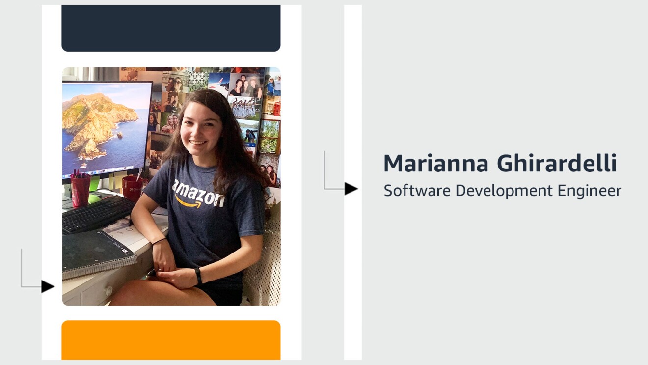 Marianna Ghirardelli wears an Amazon T-Shirt and smiles as she sits at her home office desk.