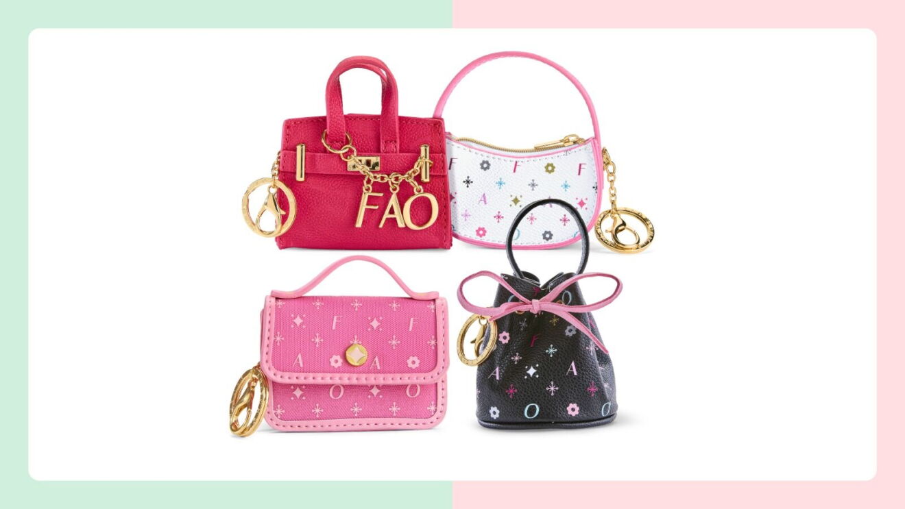 Four FAO mini bag keychains in pink, white, and black with gold hardware