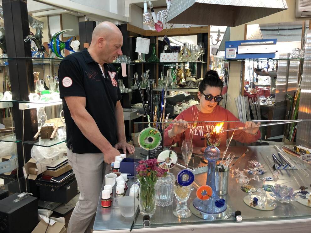 Artisans while crafting crystal goods 