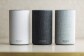 A trio of Amazon Echo devices in white, black, and grey.