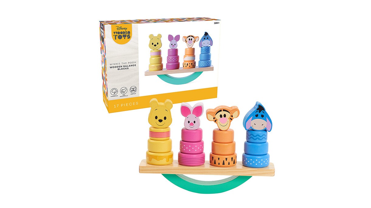 An image of a children's balancing blocks toy with Winnie the Pooh characters on them.