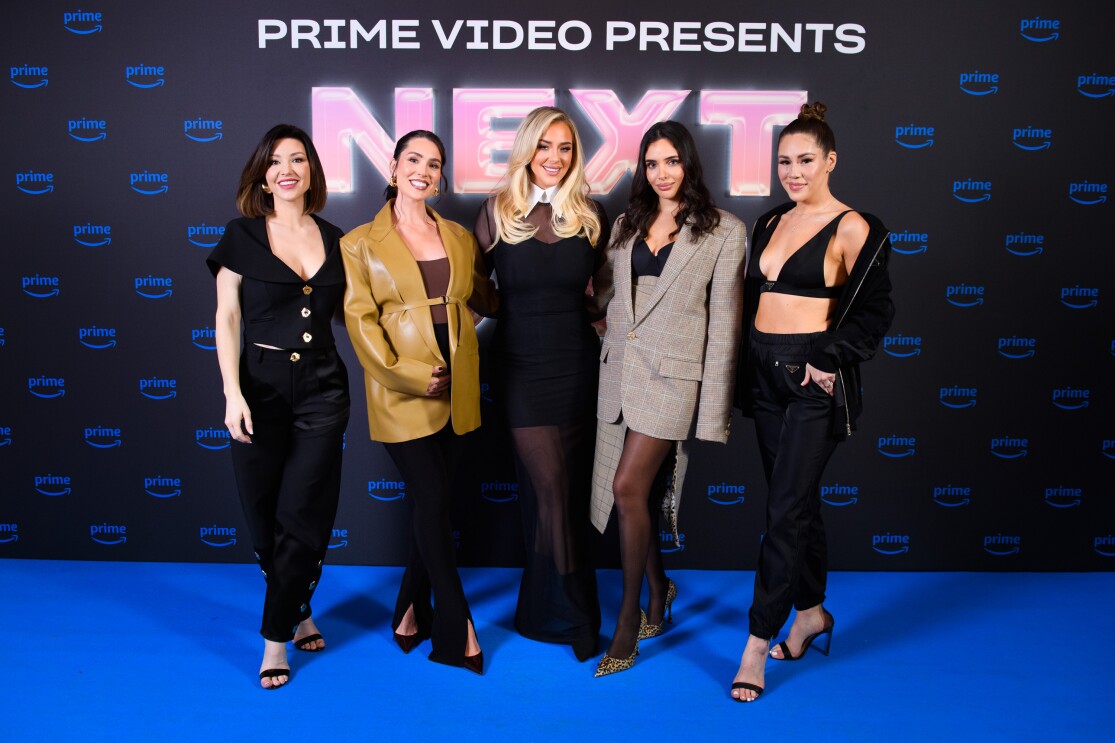 5 women standing in front of a prime video branded backdrop