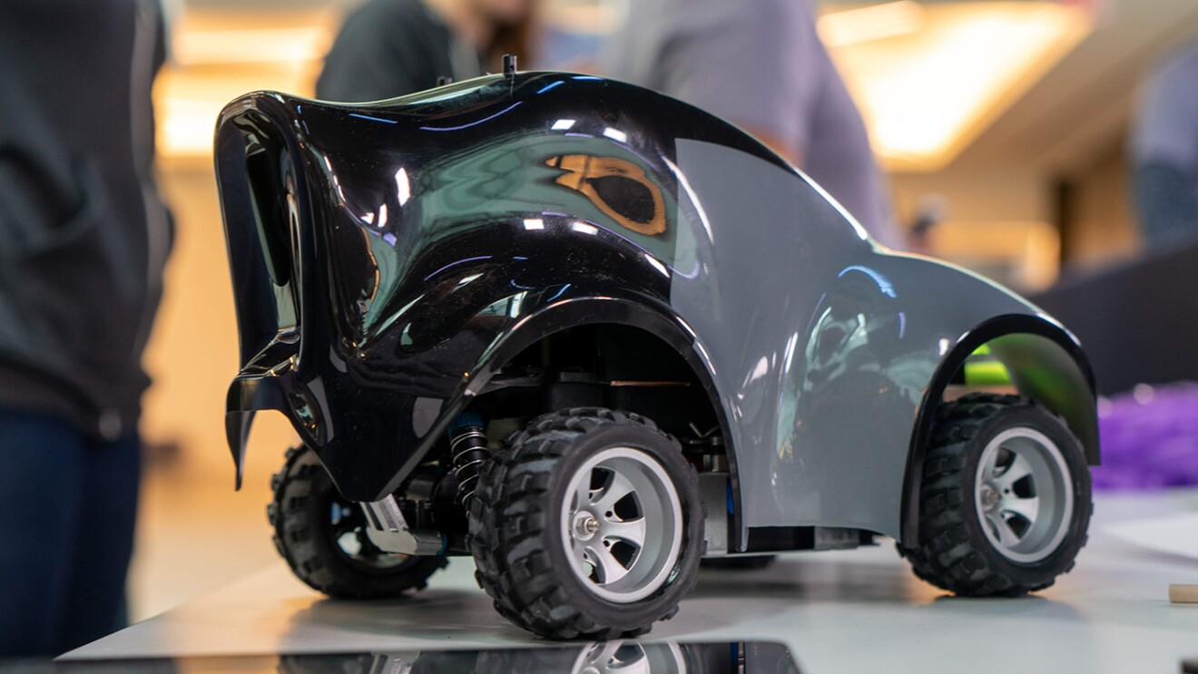 AWS DeepRacer car and track, a machine learning car with adult and kids' leagues