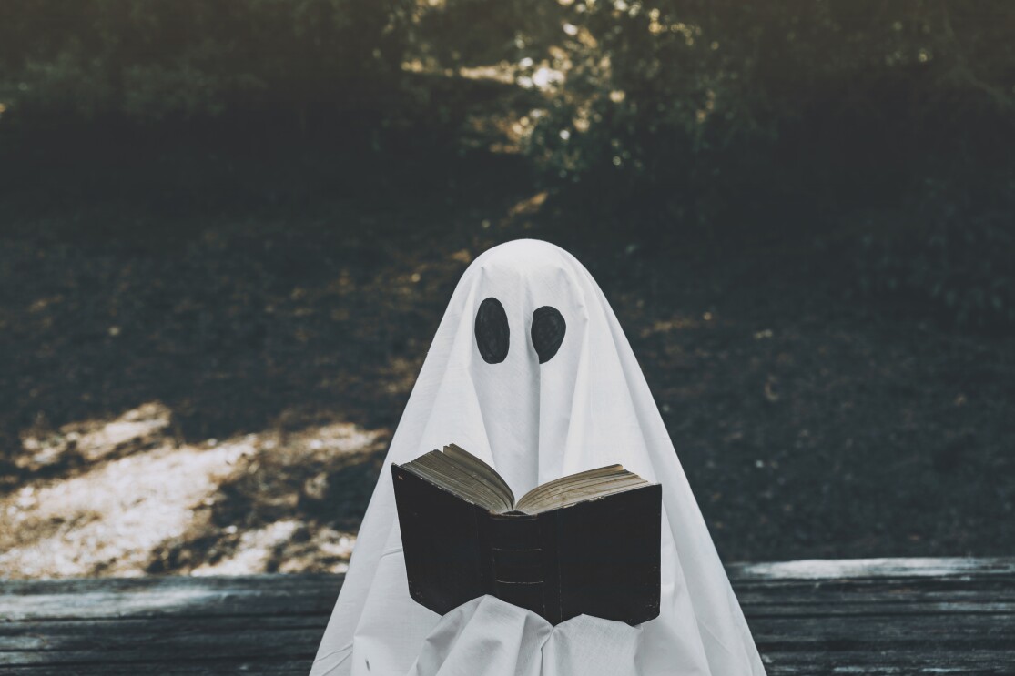 ghost-reading-opened-book-park