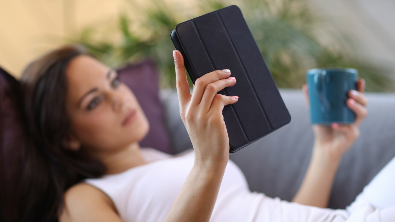 woman reading a kindle