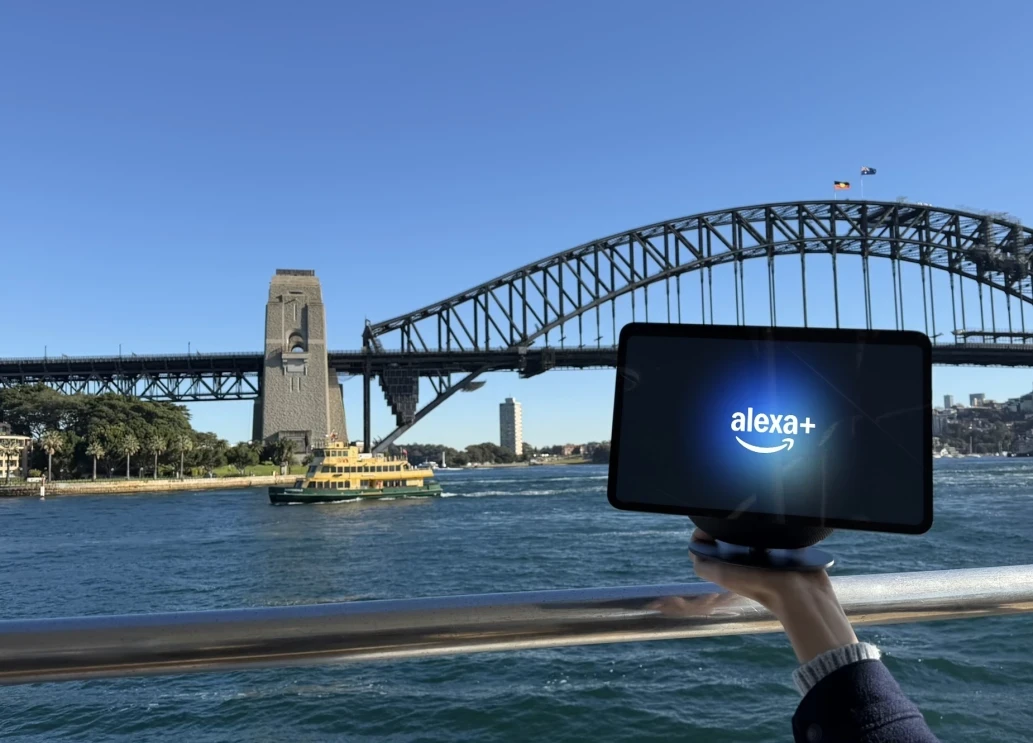 Alexa+ showing on an Echo Show with the Sydney Harbour Bridge in the background 