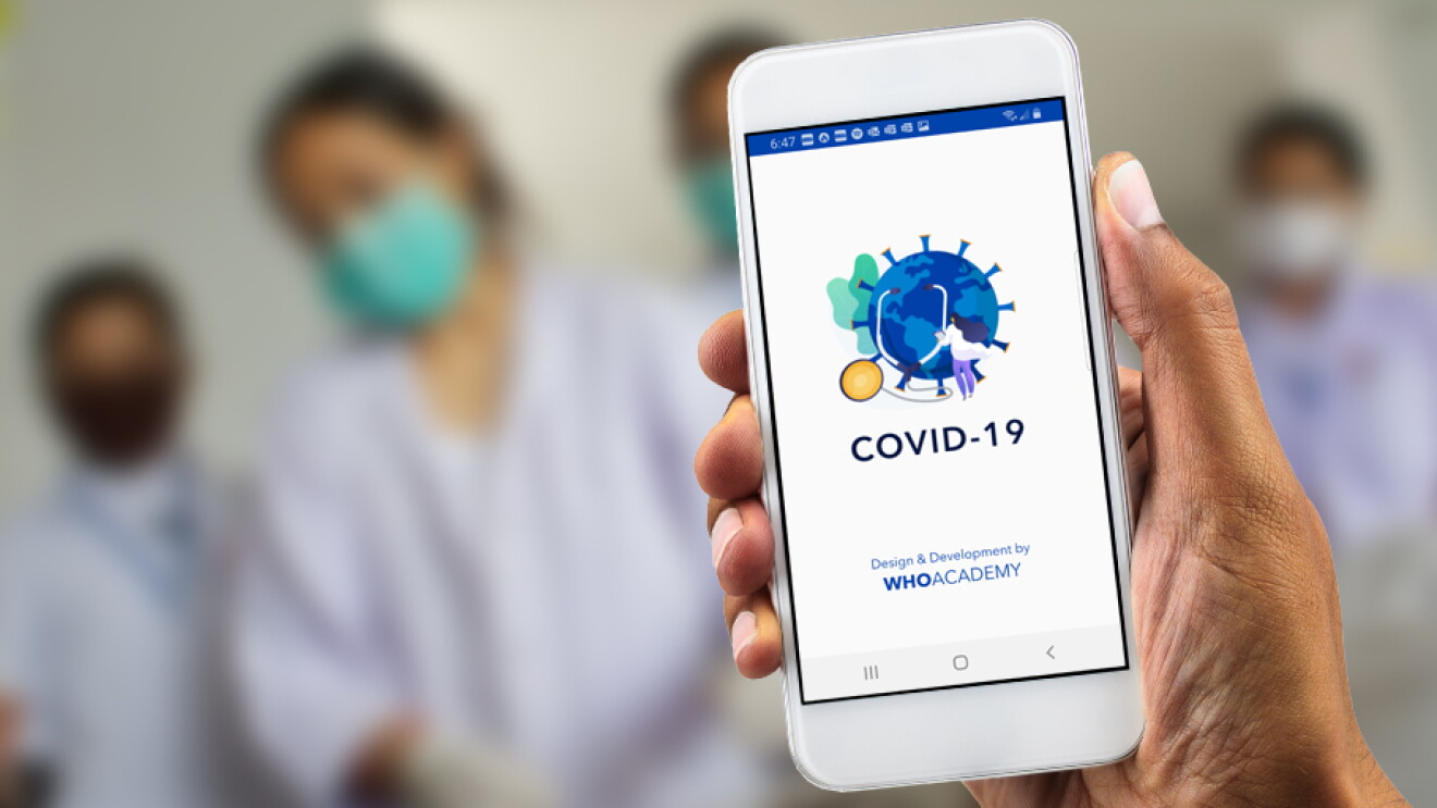 World Health Organization Academy app on a mobile phone, held in a patient's hand with four medical personnel blurred out in the background. 