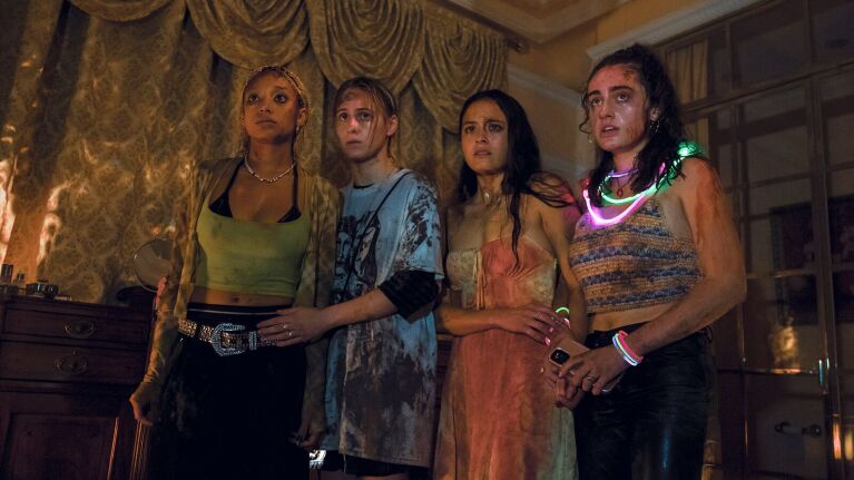 Scene from thriller movie showing tense atmosphere among friends