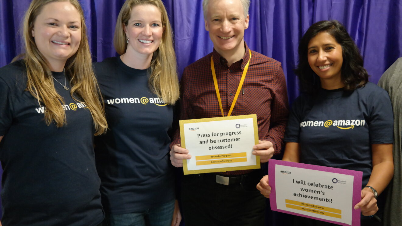 Amazon Women in Innovation Bursary program posing with Doug Gurr, UK Country Manager