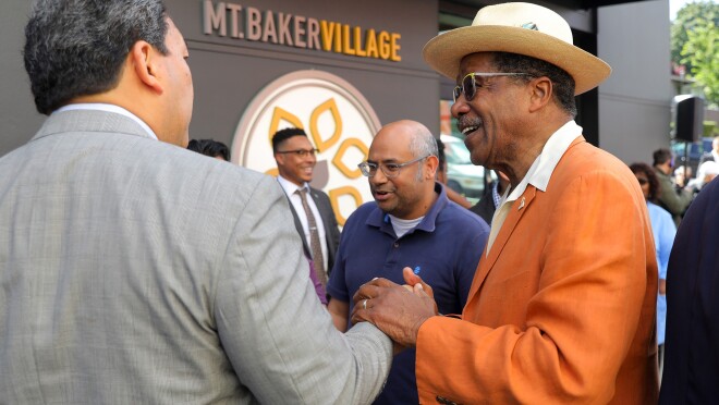 Leaders speak at Mount Baker Village, site of new affordable housing being built with support from Amazon's Housing Equity Fund