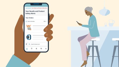 Graphic image of an older woman looking down at her phone while she sits at the kitchen counter. Her phone screen displays the "Your Recalls and Product Safety Alerts" page.