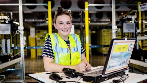 Rosie McCarthy, operations apprentice at Amazon in Tilbury, pictured at work