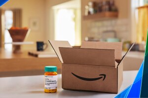 Amazon package with bottle of prescription medication