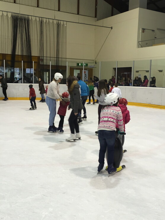 Amazon in the community takes refugees ice skating