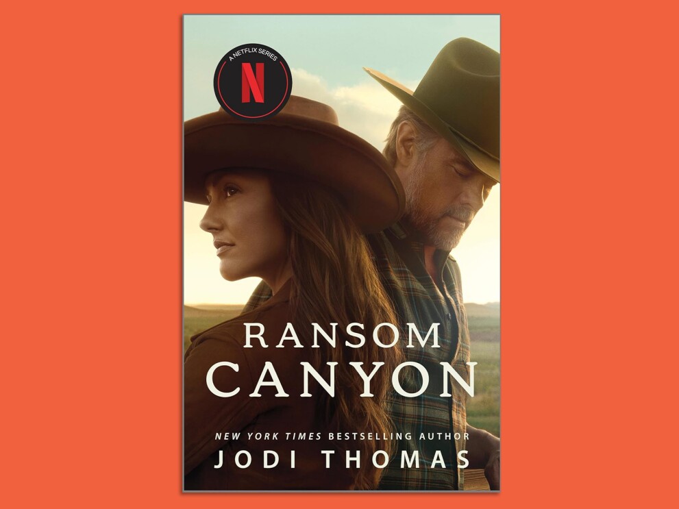 Book cover of 'Ransom Canyon' by Jodi Thomas, featuring a couple in cowboy hats