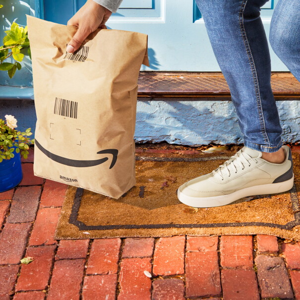 Same-Day Delivery customer picking package from doorstep