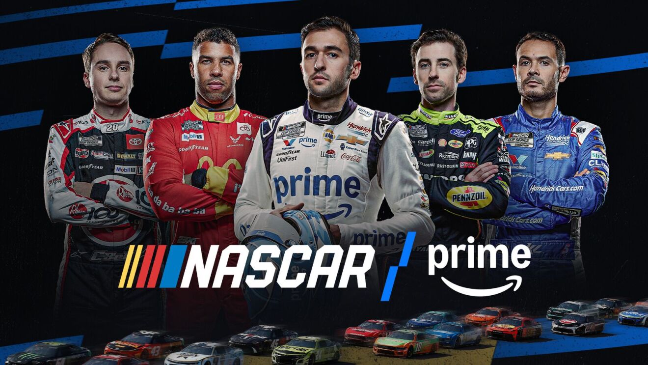 Five NASCAR drivers posing in colorful uniforms with NASCAR and Prime logos.