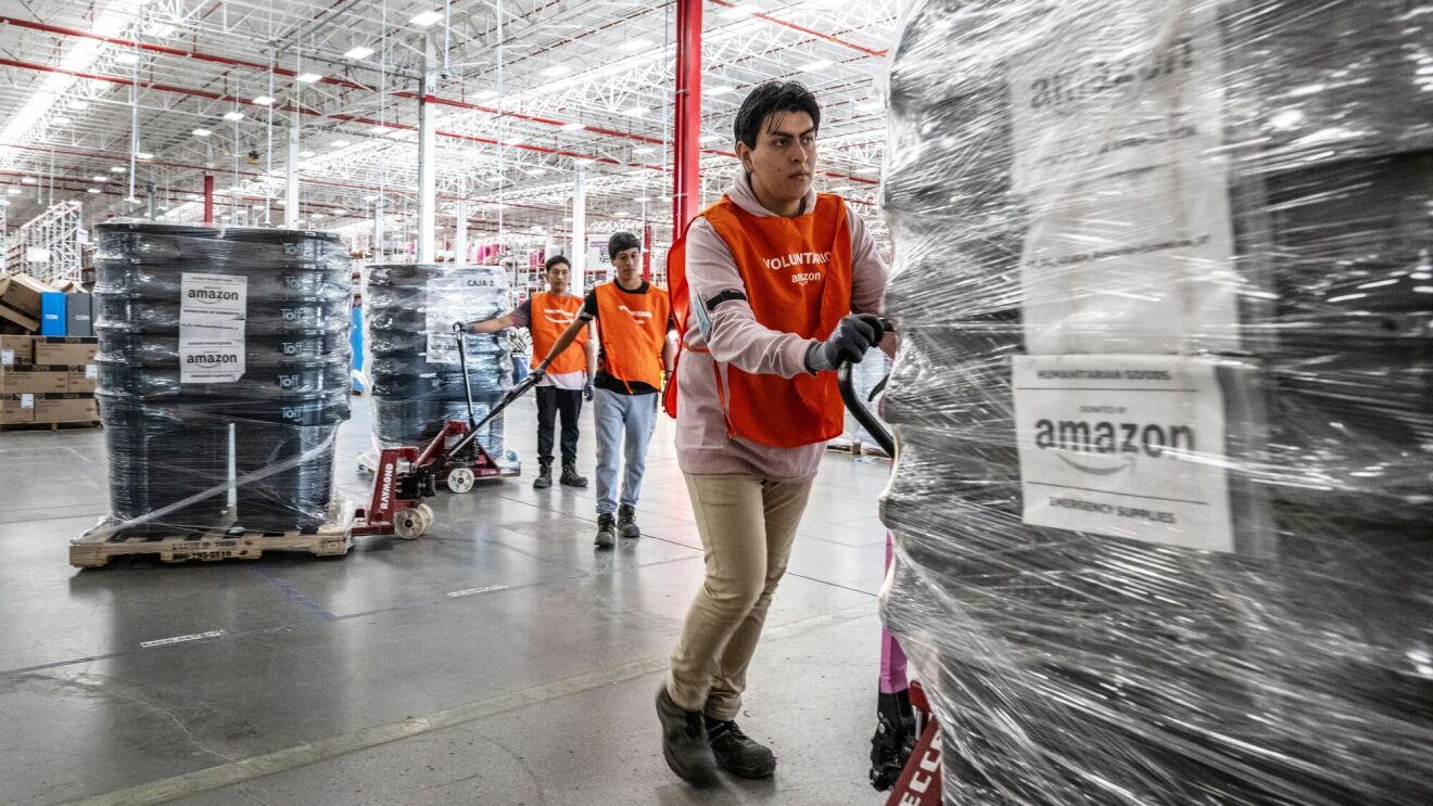 Amazon Disaster Relief response to the flooding in Mexico showing volunteers on the ground distributing aid