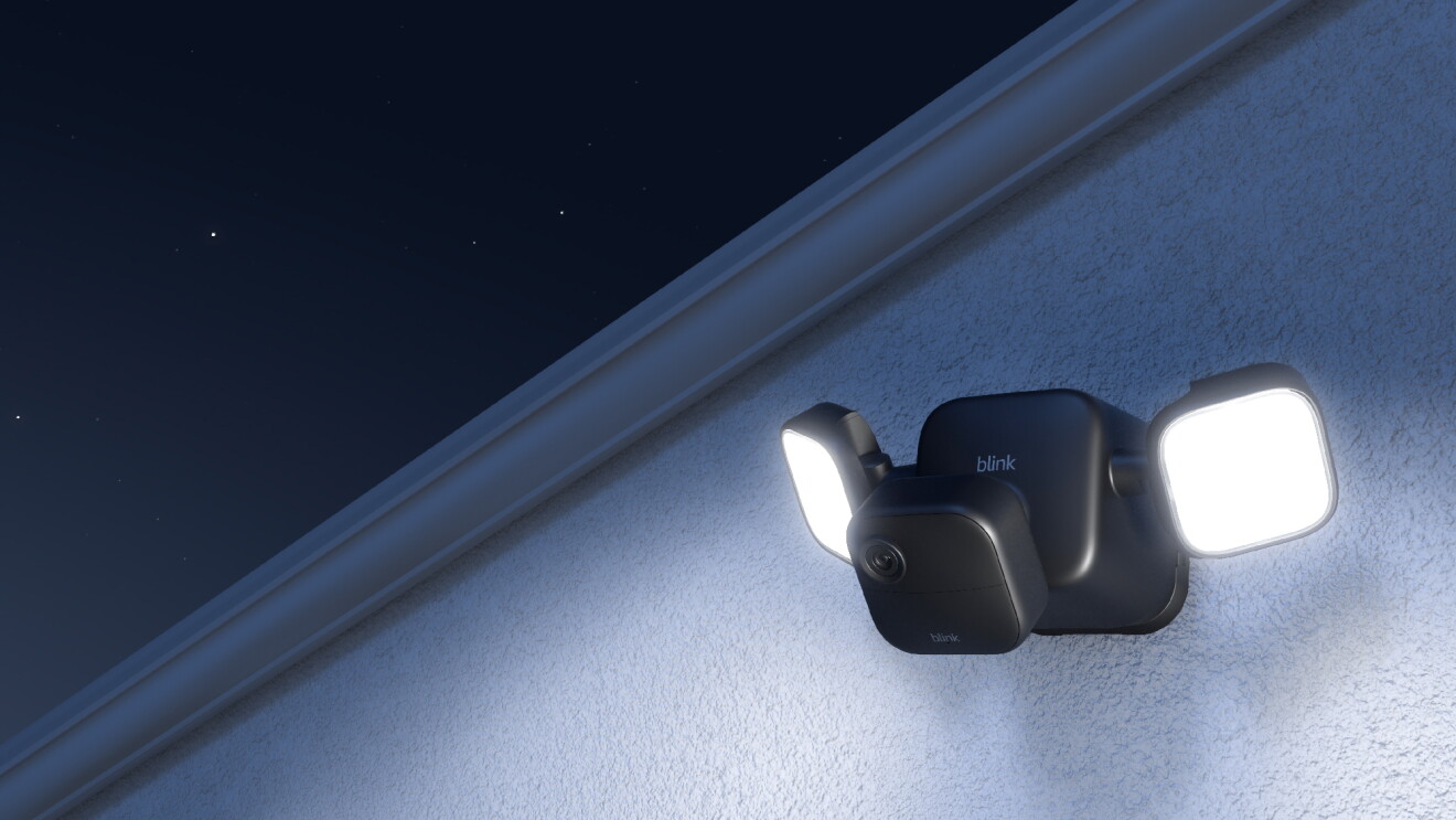 An image of a Blink Outdoor 4 camera mounted on a wall. 