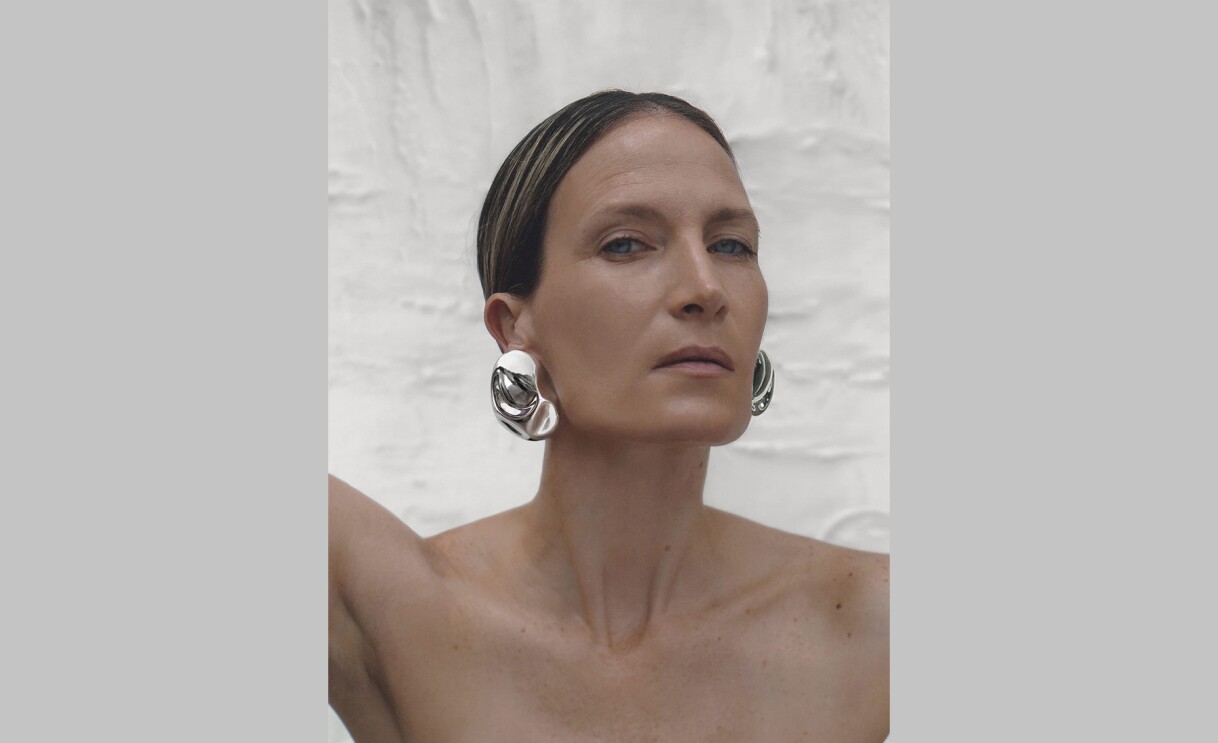 An image of a model wearing earrings by sordo.