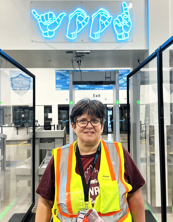 An image of Susan Meadows in an Amazon fulfillment center.
