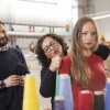L'imprenditore leonardo Dondini nel maglificio di famiglia insieme ad un'impiegata, provando un capo di cashmere su una modella