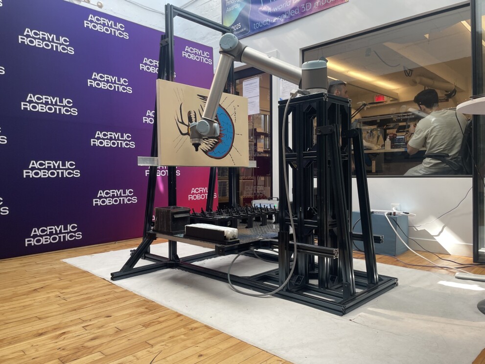 Acrylics Robotics' robotic arm analyzing a piece of art