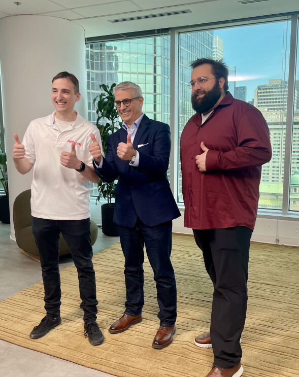 three men standing 