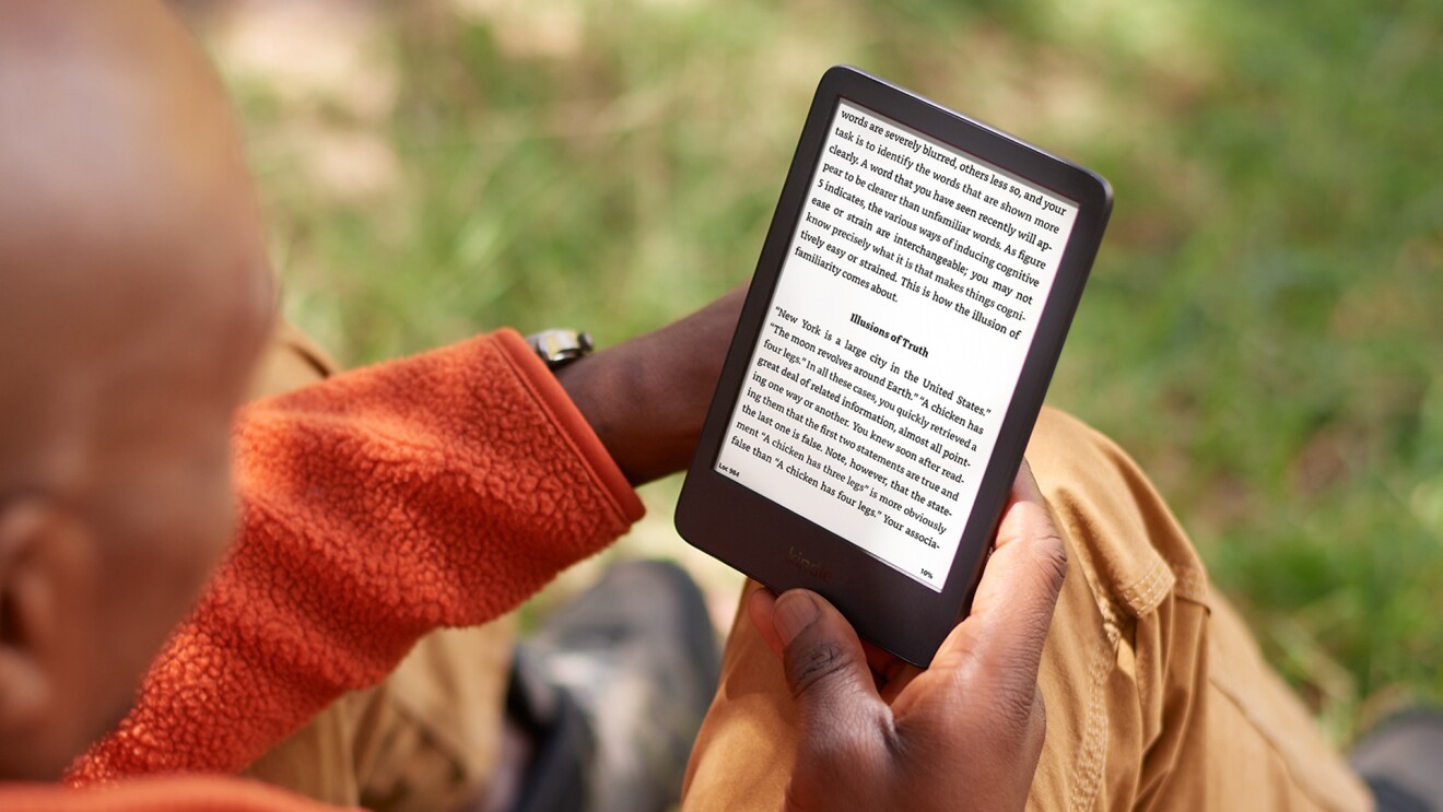 A person reading on a Kindle device.