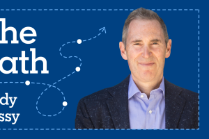 An image of Andy Jassy on a blue background and text that reads "The Path, Andy Jassy."