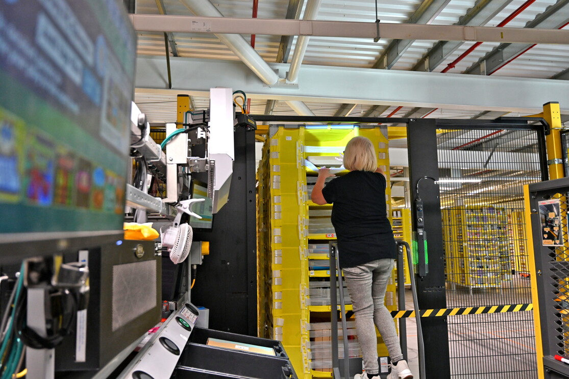 A fulfilment centre employee at their workstation