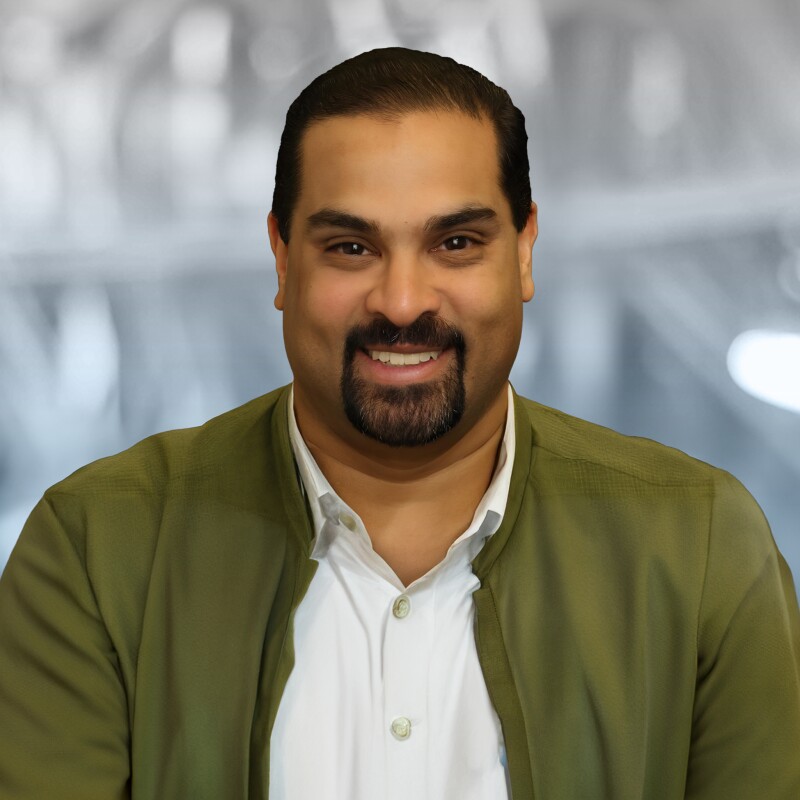 A headshot of Rajiv Mehta