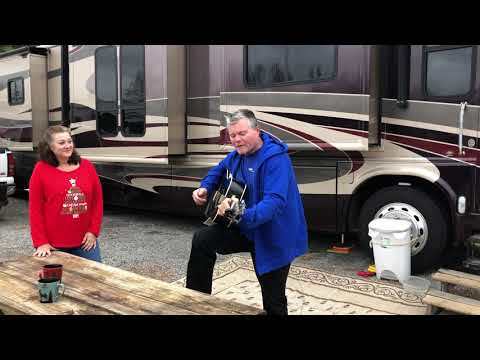 Kenny Bunch sings outside his motorhome