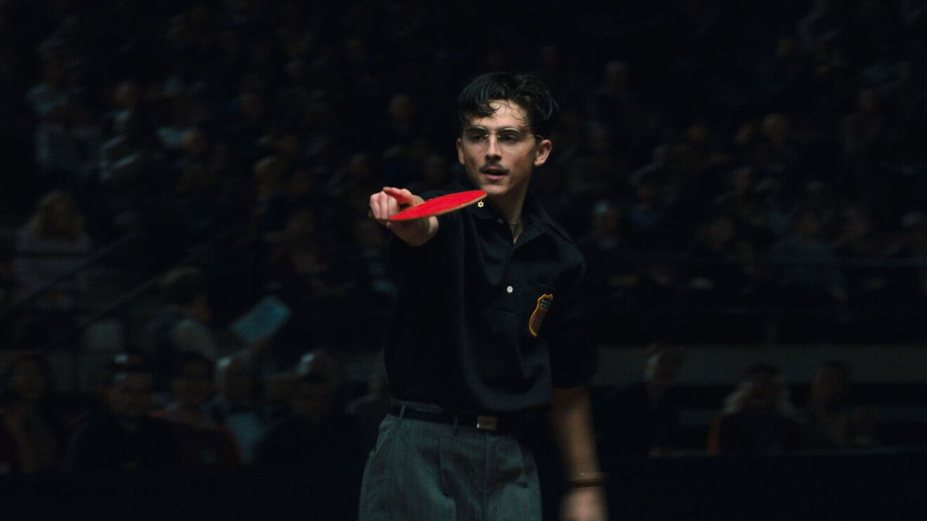 A ping-pong player hits the ball