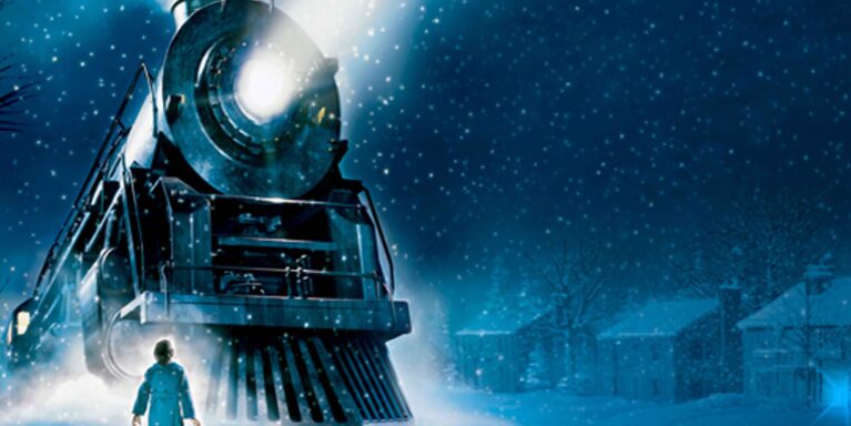 Eine Szene aus dem Film "Der Polarexpress" mit einer großen Lokomotive, die in der Nacht durch Schnee fährt.