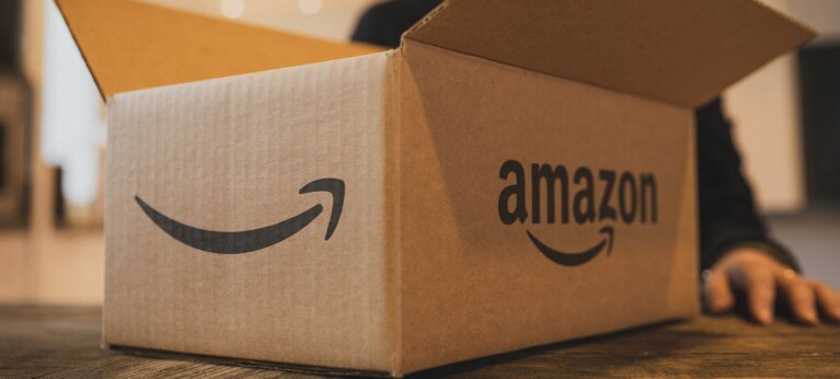 Amazon delivery box open on a table